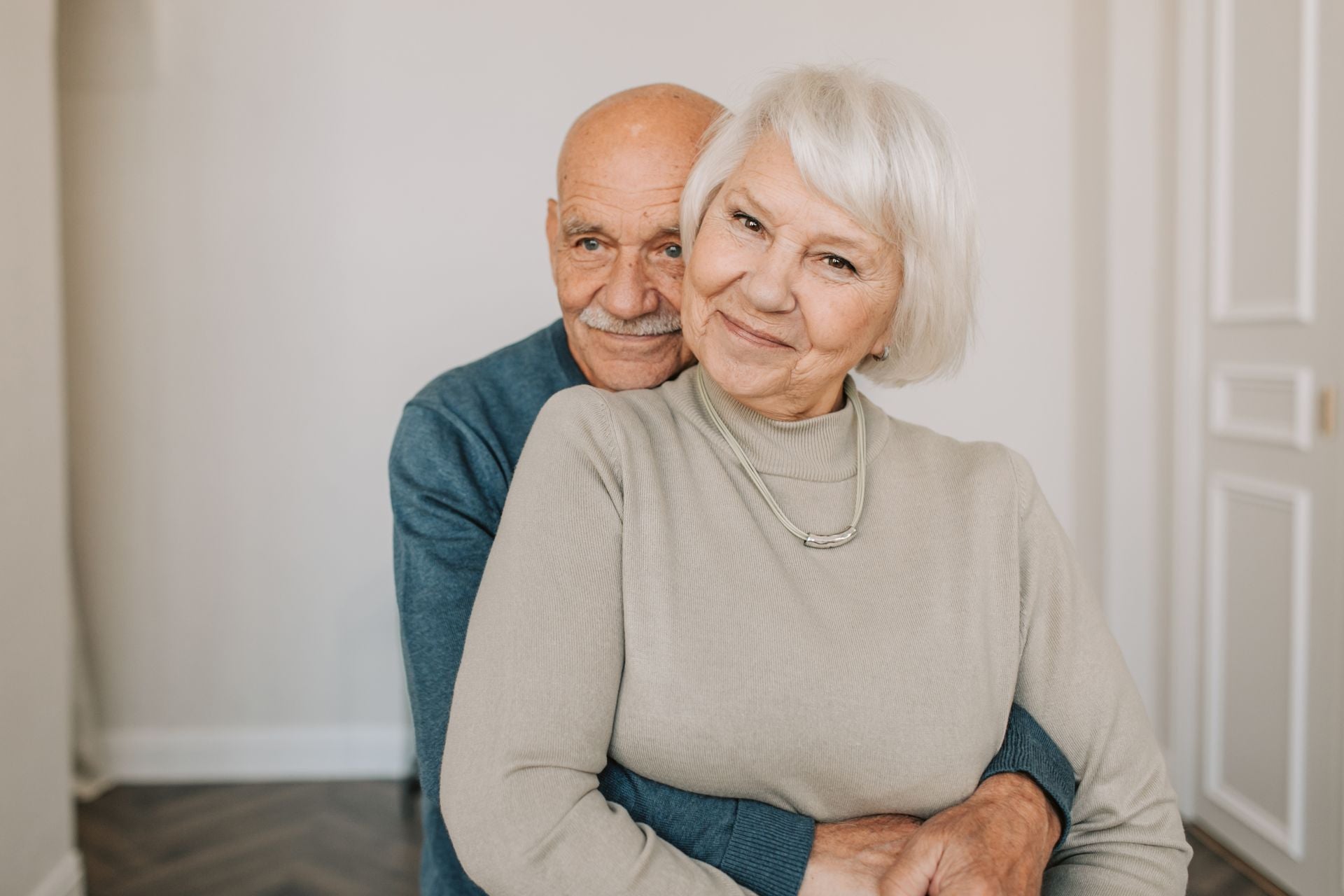 Happy senior couple at home - Care Living hero